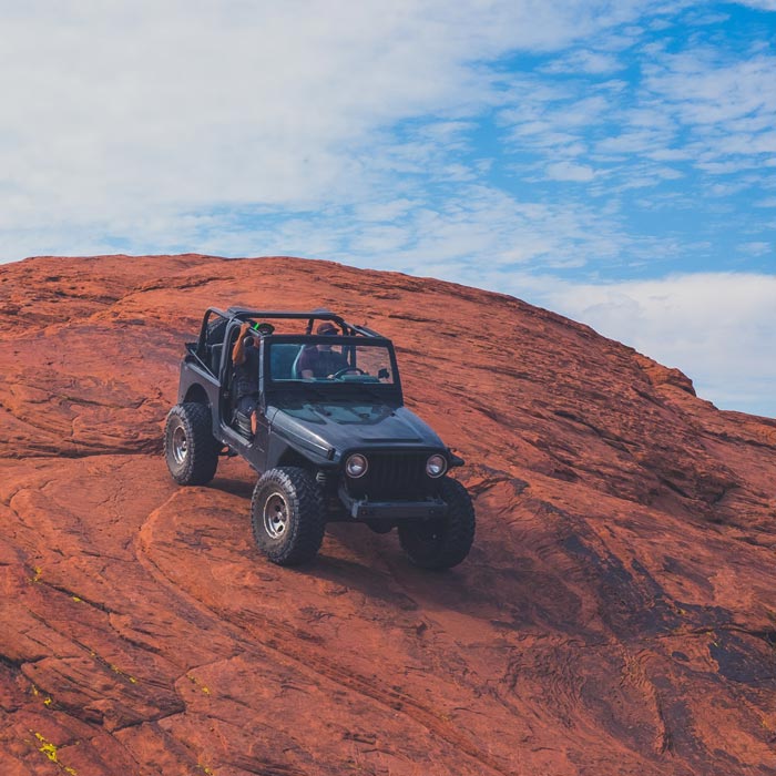 jeep on rocky cliff