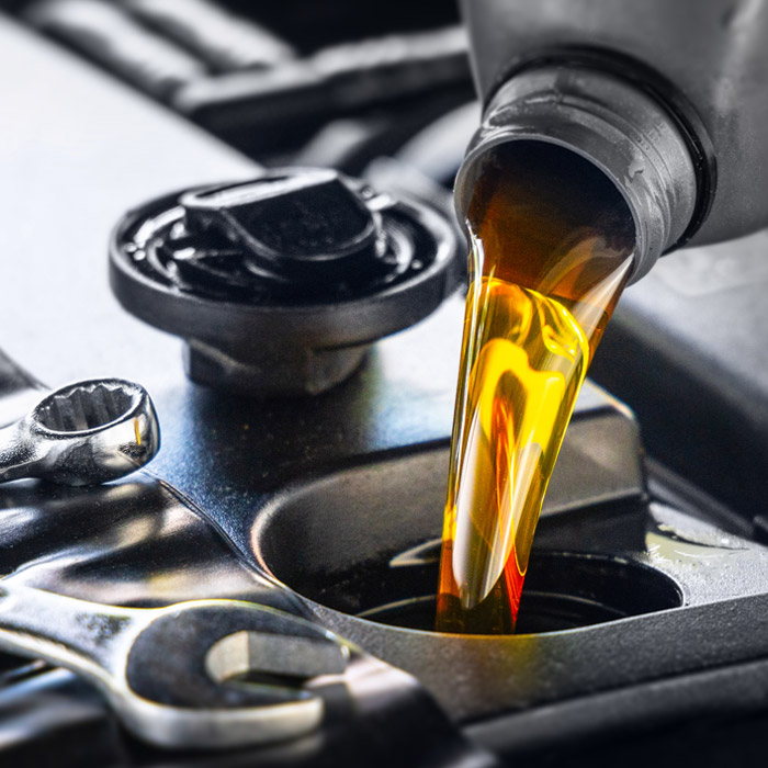 oil being put into car
