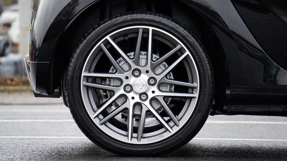 Close-up of car alloy wheel and tire