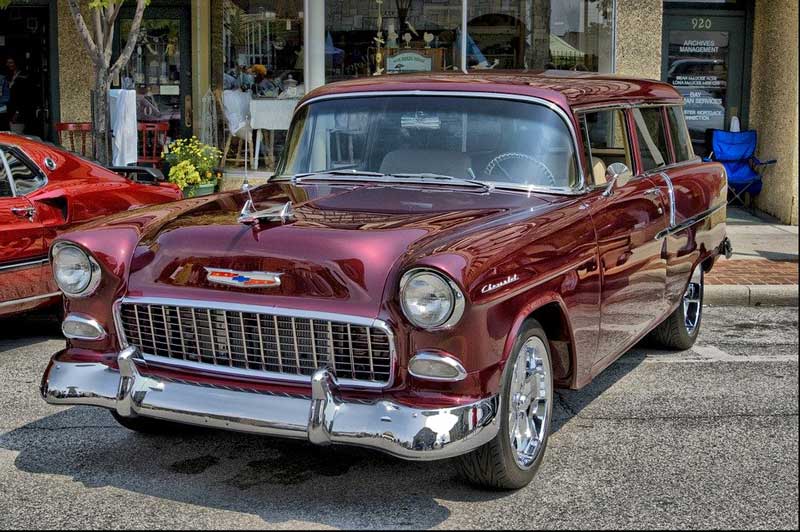 Classic maroon Chevrolet car parked on street