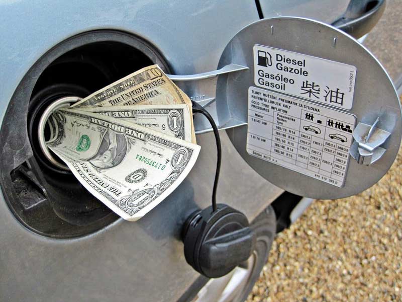 Dollar bills inside car fuel tank