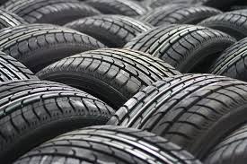 Stack of car tires with tread pattern